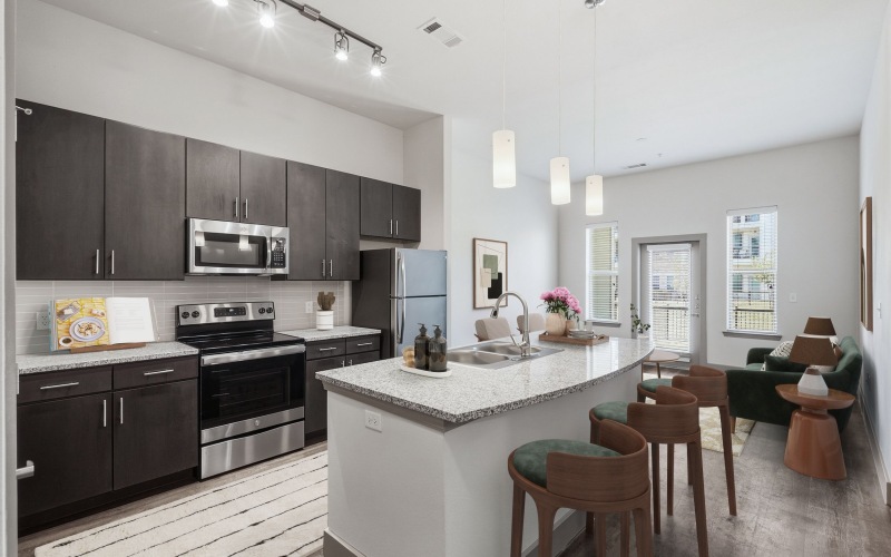 spacious kitchen with islands and quartz countertops