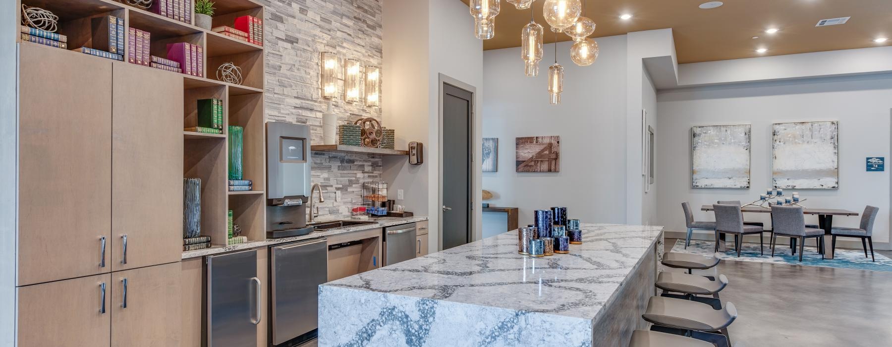 a kitchen with a table and chairs