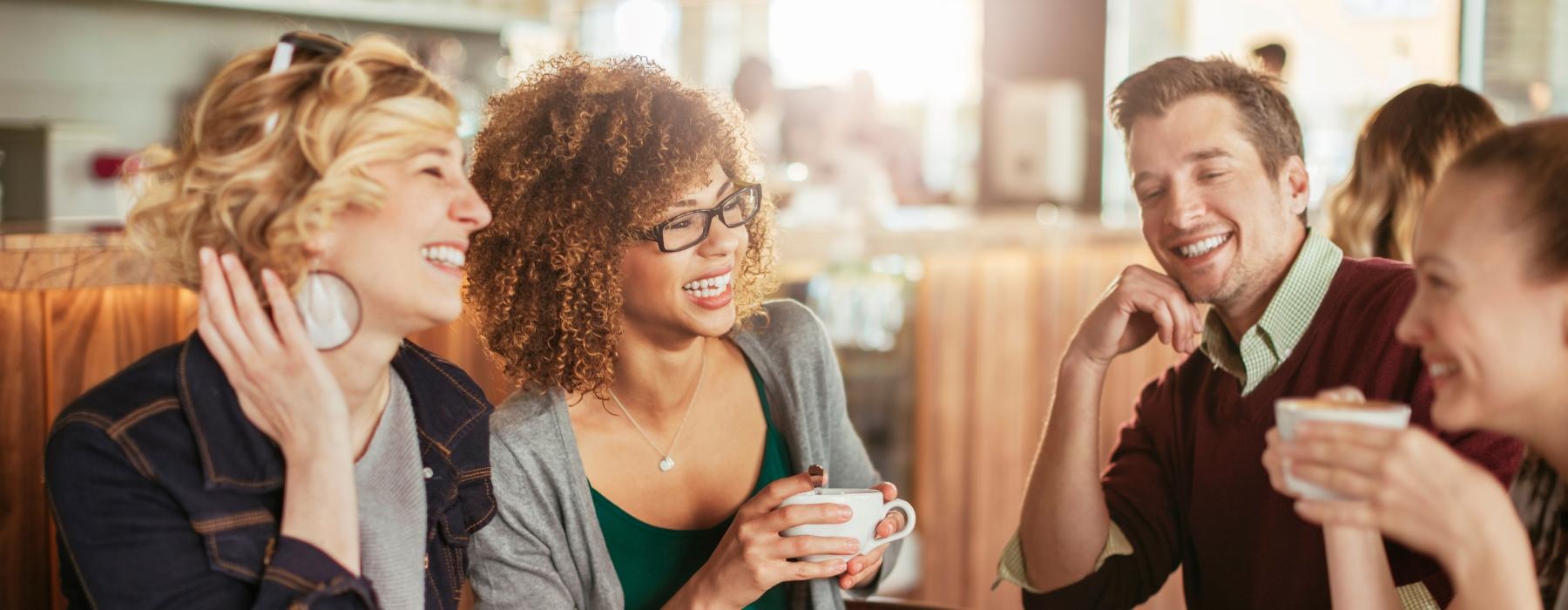 a group of people sitting at a table