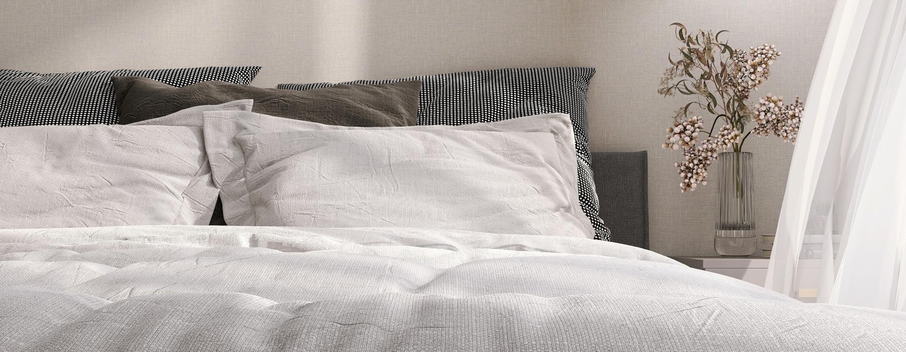 a bed with a white sheet